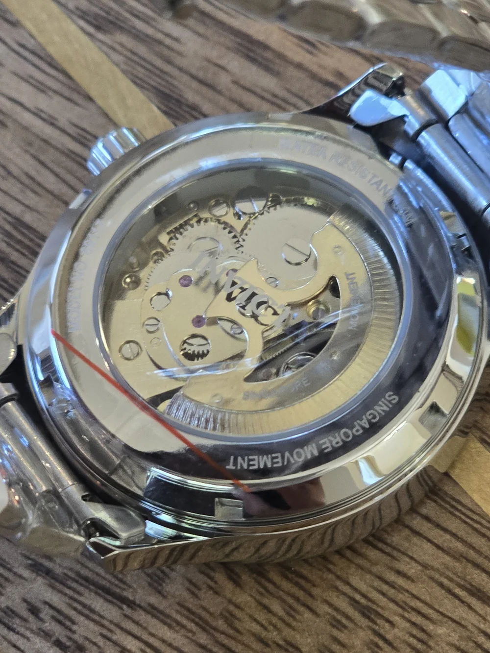 Invicta Men's Silver Skeleton Dial Automatic Watch with White Accents